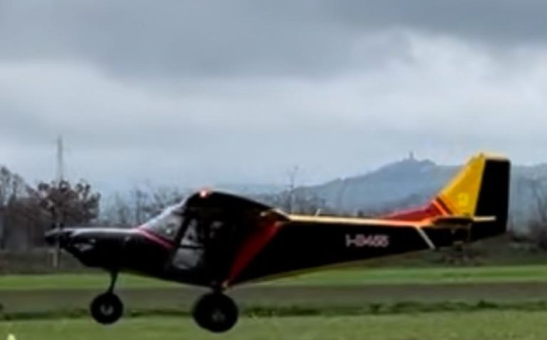 Small plane taking off on runway