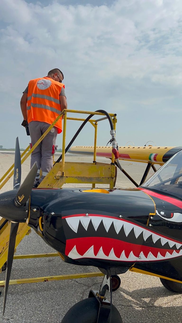 Refueling shark-nosed aircraft on runway