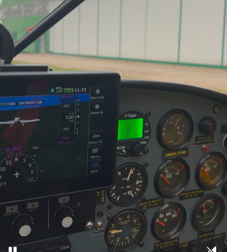 Airplane cockpit instruments and navigation panel display.
