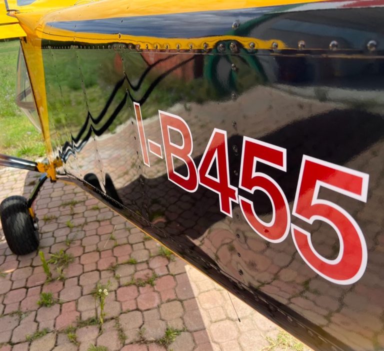 Close-up of airplane with registration I-B455.