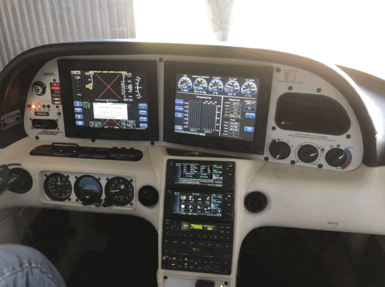 Airplane cockpit with instrument panel displays.