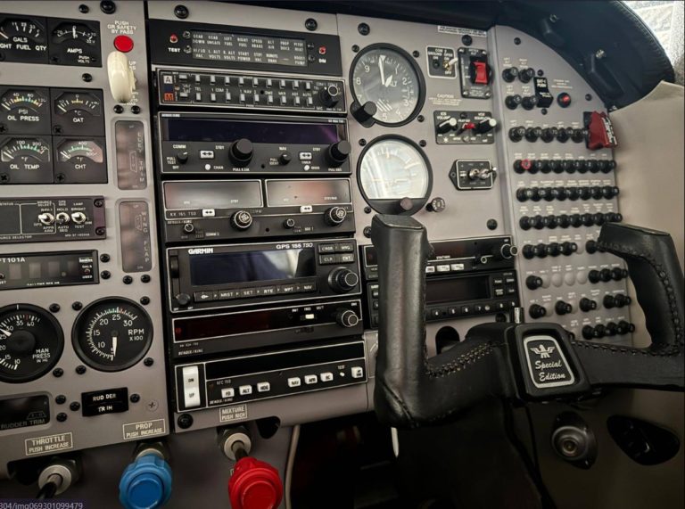 Airplane cockpit instrument panel and controls.