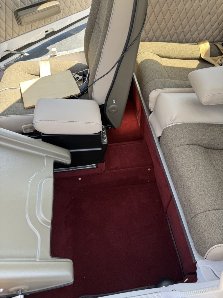 Car interior with beige and red upholstery