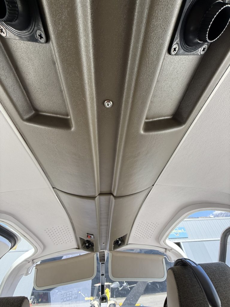 Interior roof of an aircraft cabin.