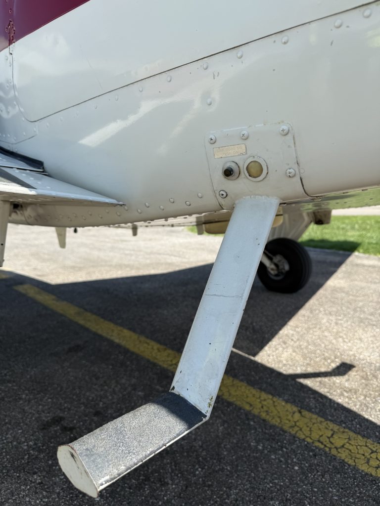Plane step ladder and fuselage close-up