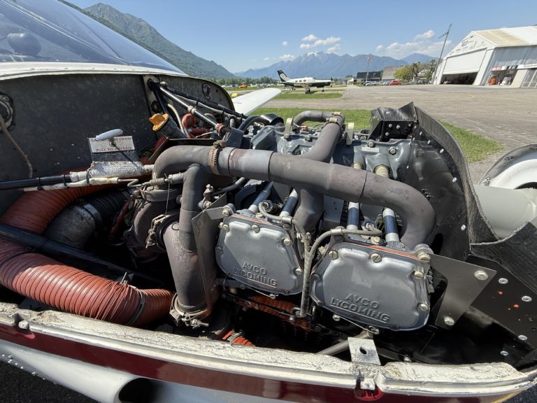 Aircraft engine with mountains in background