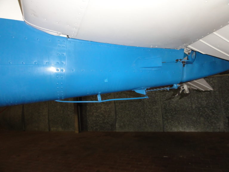 Close-up of blue aircraft fuselage section