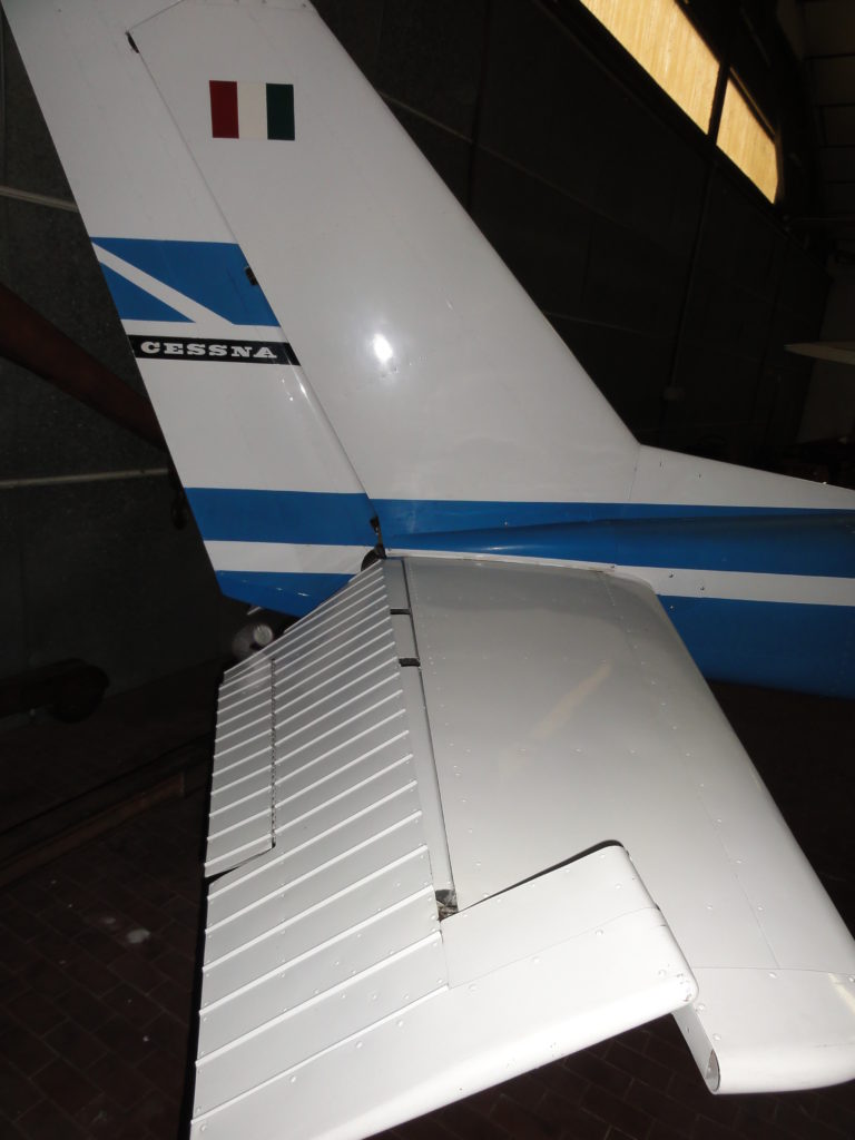 Cessna airplane tail with Italian flag logo