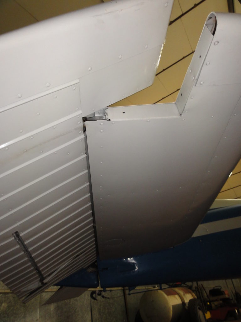 Close-up of airplane tail section.