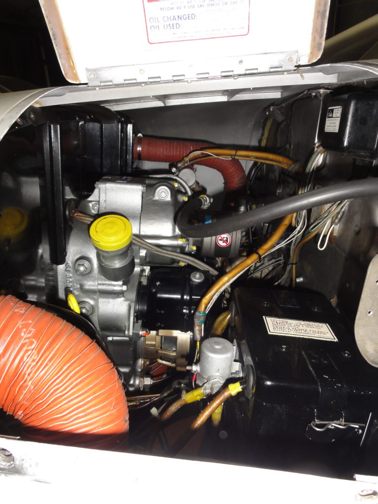 Airplane engine compartment with visible components.