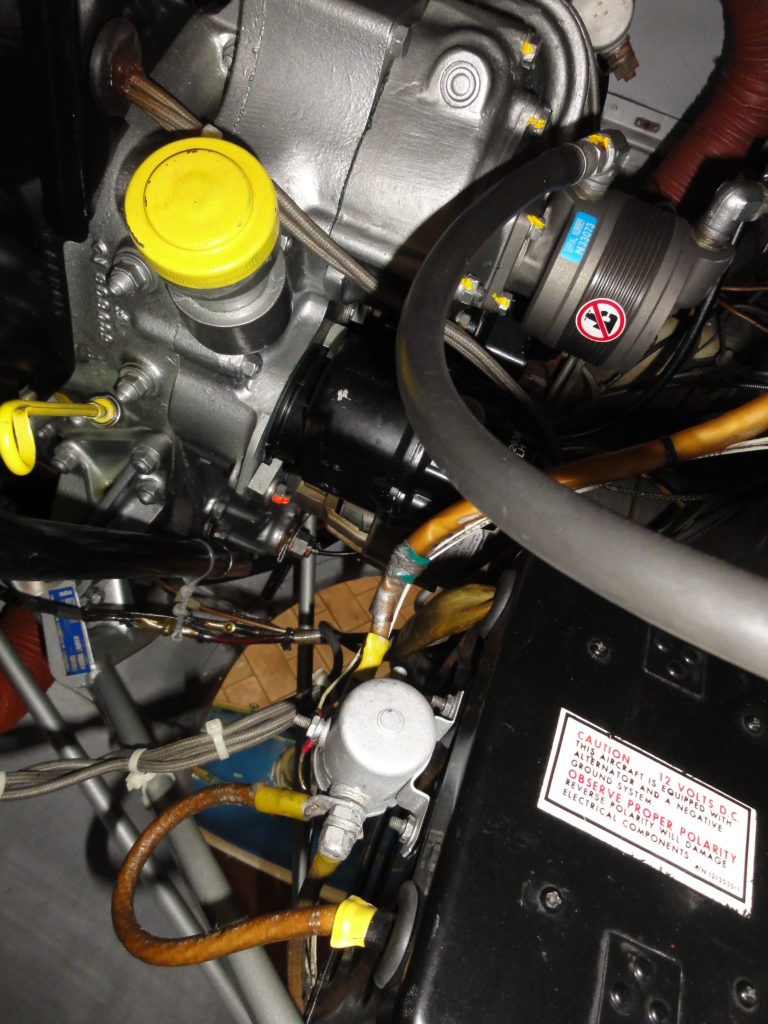 Close-up of complex engine components and wiring.