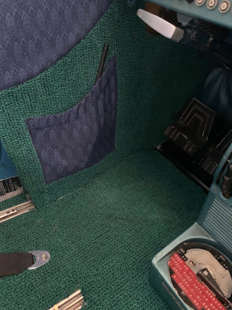 Cockpit floor with pedals and controls.