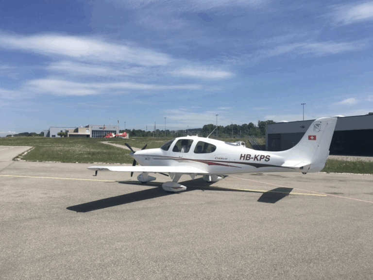 Small airplane on airport runway