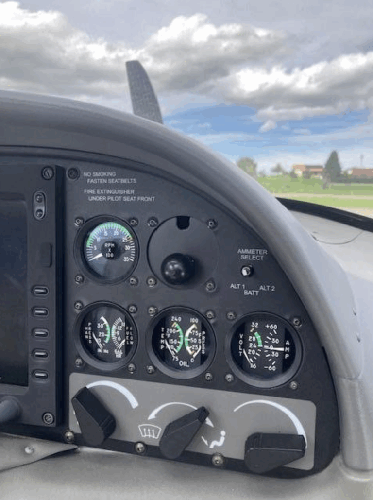Airplane cockpit instruments and controls panel display.